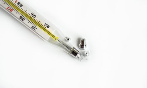 broken glass thermometer broken glass thermometer on white background
