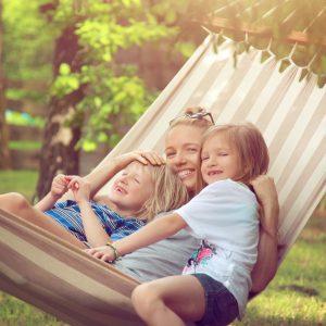Family sitting in hammock