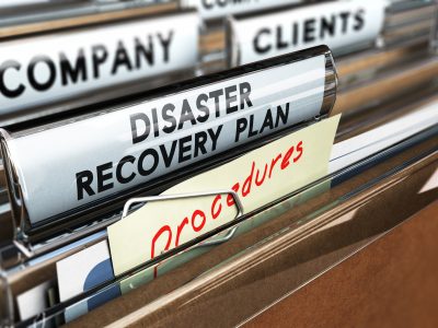 DRP, Disaster Recovery Plan Close up on a file tab with the text Distaster Recovery Plan, focus on the main text and blur effect. Concept image for illustration of DRP ans crisis communication.